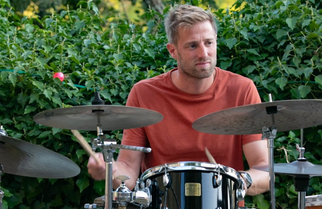 David de Vries playing drums
